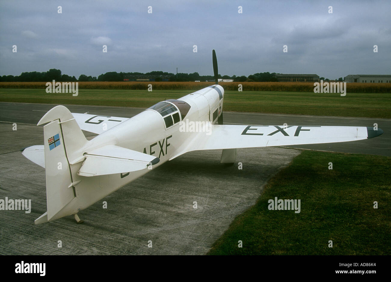 Percival Mew Gull G-AEXF air racing aircraft of the Real Aeroplane Company, on dispersal at Breighton airfield Stock Photo