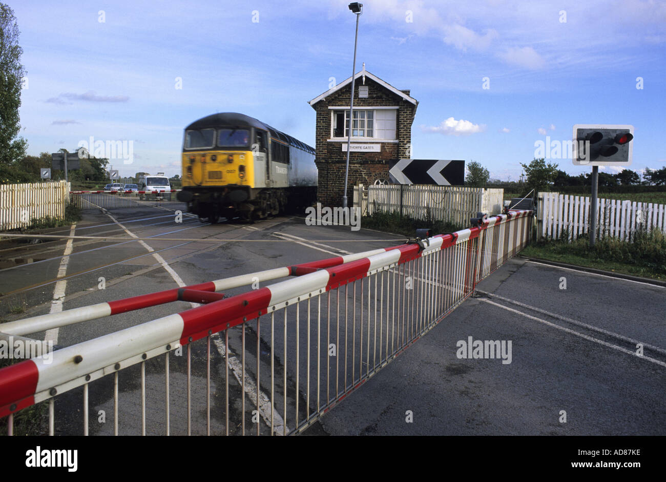 Train Passing Level Crossing And Signal Box At Thorpe Willoughby Yorkshire Uk Stock Photo Alamy