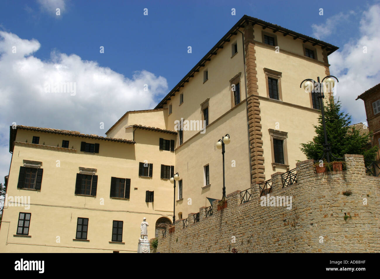 Imposing restored 15th century Palazzo in the main piazza of  the charming hilltop town of Monte san Martino in Le Marche Italy Stock Photo