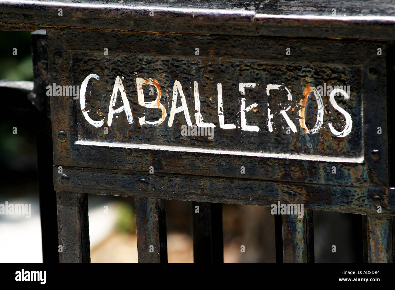 Caballeros Mens toilets sign in Spanish Stock Photo Alamy