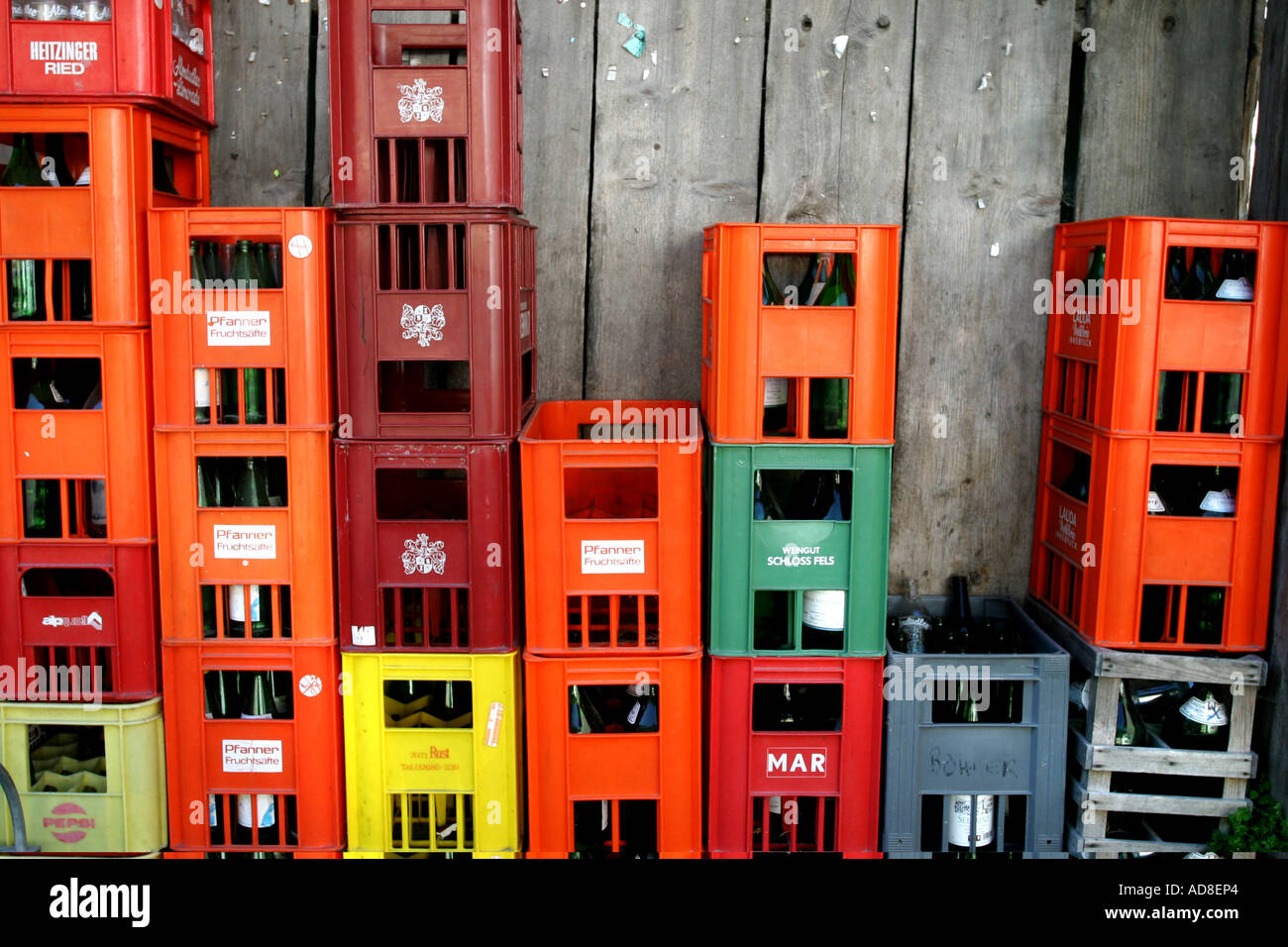 A stack of softdrink crates outside a store in Elbigenalp, Austria Stock Photo