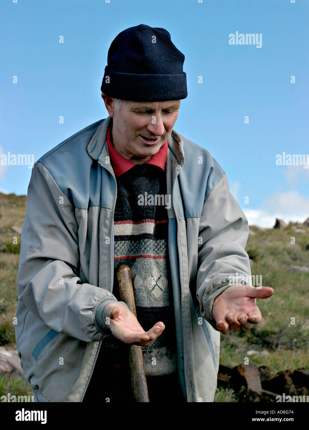 These Hands Peat digger Chris Gallagher takes a break from digging to show the calluses on his hard working hands Stock Photo