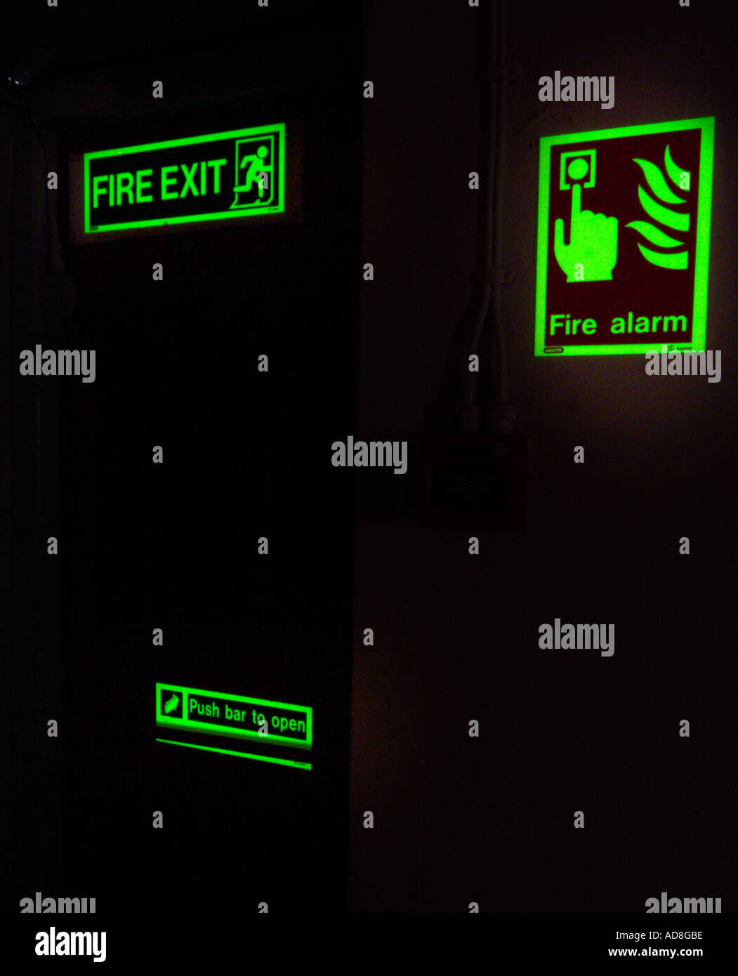 Glowing fire exit signs Stock Photo Alamy