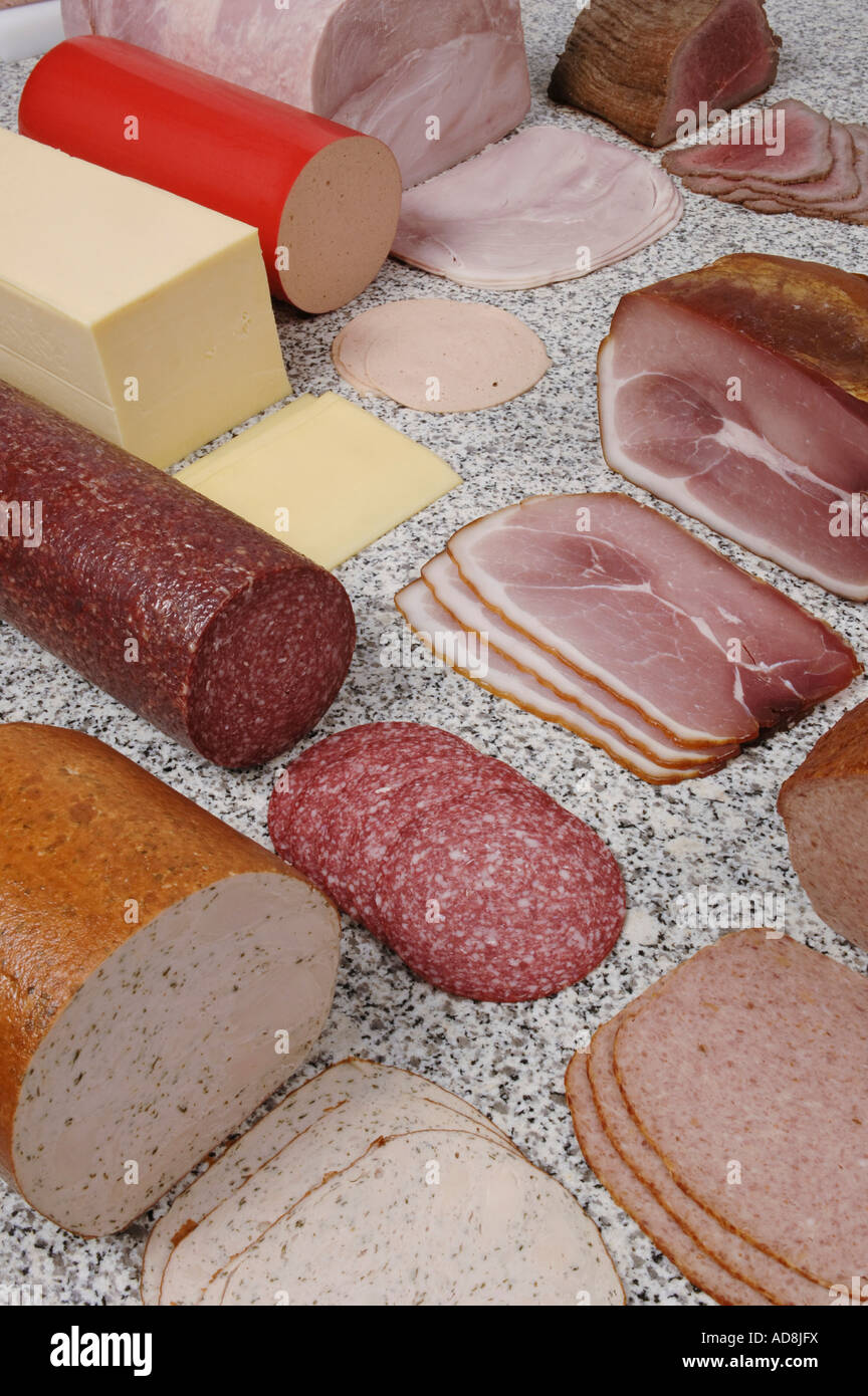 Selection of sliced hams salami and cheese Stock Photo Alamy