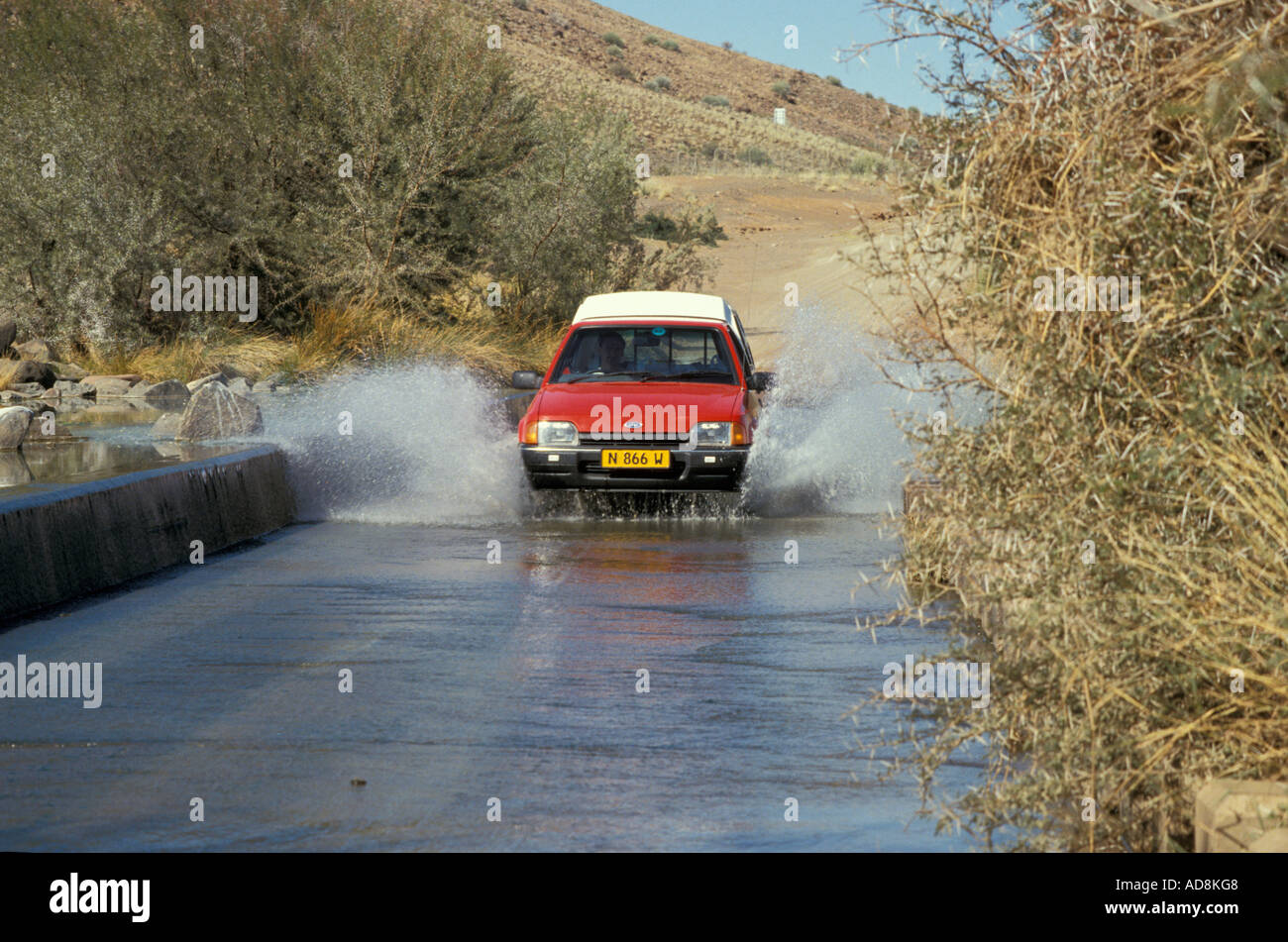 car going through water