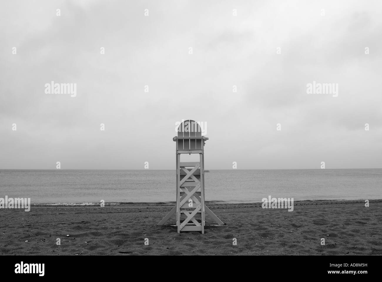 Lifeguard chair on empty beach Stock Photo - Alamy