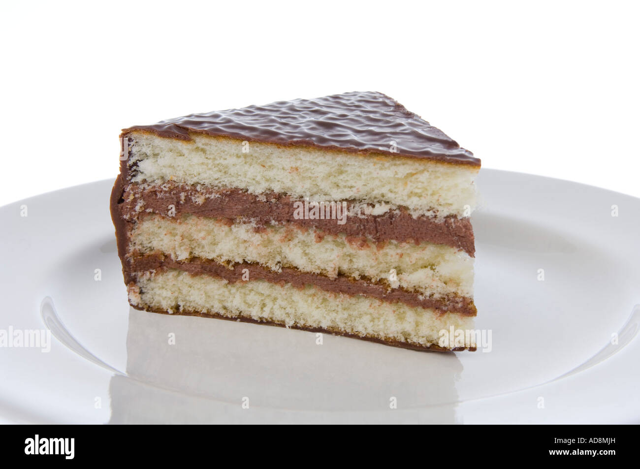 A slice of chocolate sandwich sponge cake Stock Photo