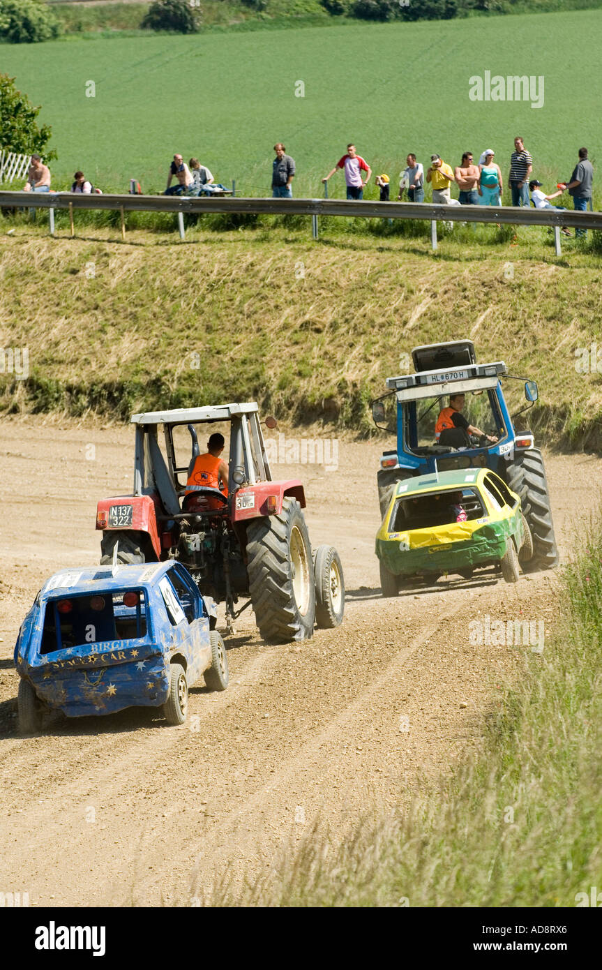 gymkhana car crash race, towing of cars with tractors Stock Photo