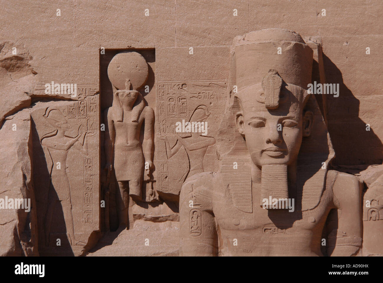 Huge Sun Temple of Abu Simbel decorated by 20-metre height colossi of Ramesses II near Aswan, Egypt Stock Photo