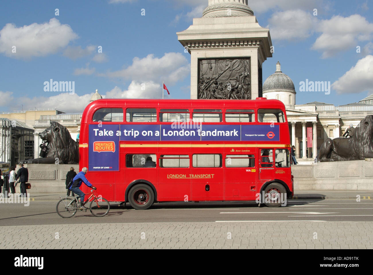 Trafalgar Square close up of red Routemaster double deck bus route 15 advert promoting Heritage Route Nelson Column Stock Photo