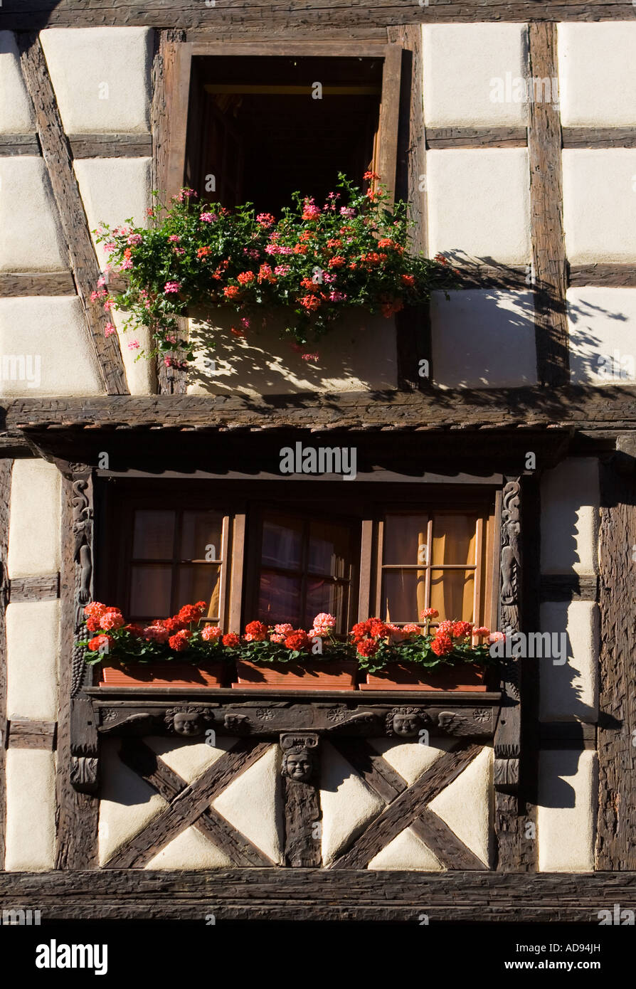 Timbered Carved medieval half timbered house facade detail, Riquewihr, Alsace ...