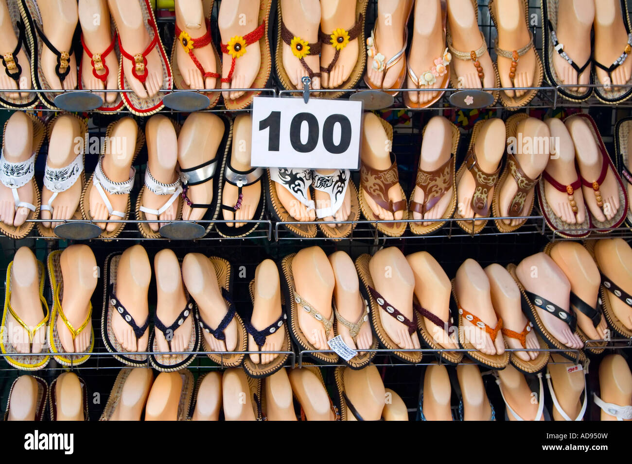 Sandals at market stall, Khao San Road, Bangkok, Thailand Stock Photo