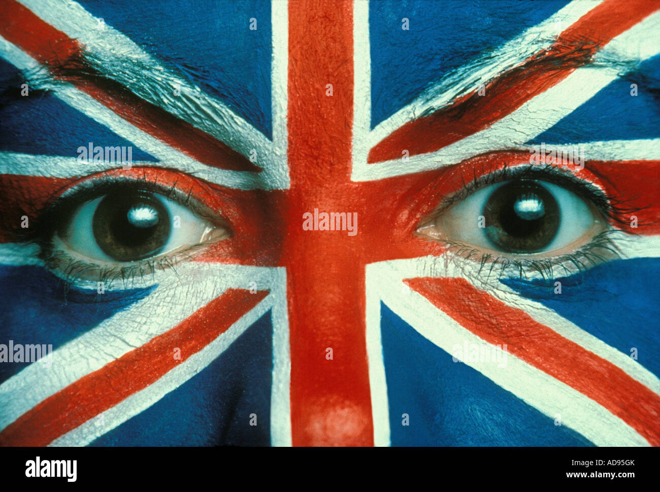 Woman s face painted with Union Jack Stock Photo
