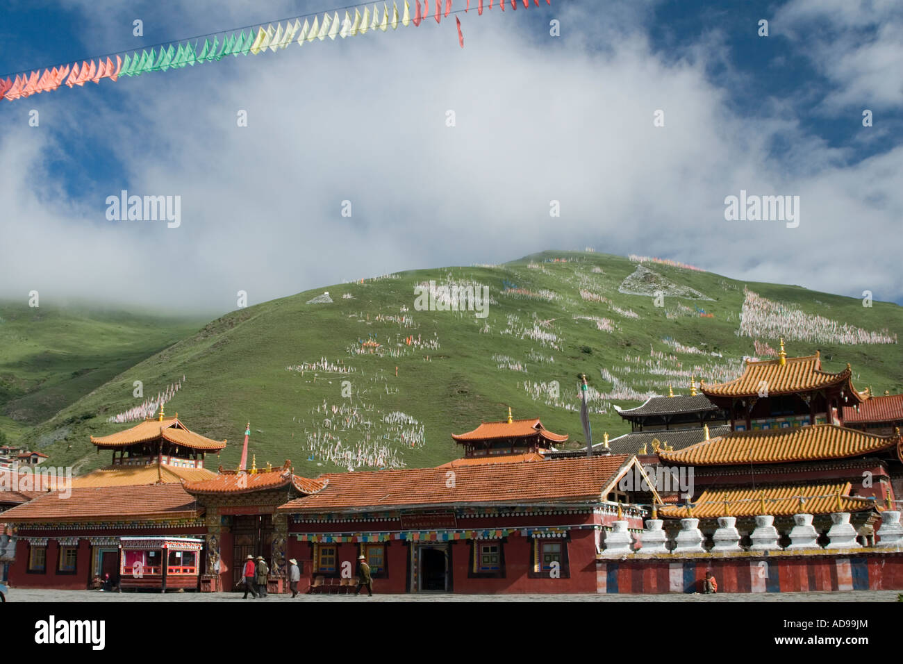 Tagong Monastery The large monastery, and prayer flags in the surrounding mountains, at ...