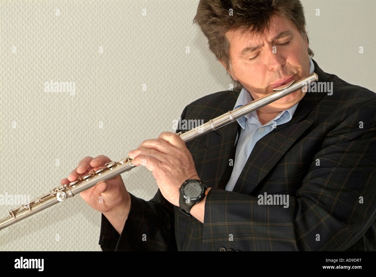 musician playing transverse flute Stock Photo Alamy