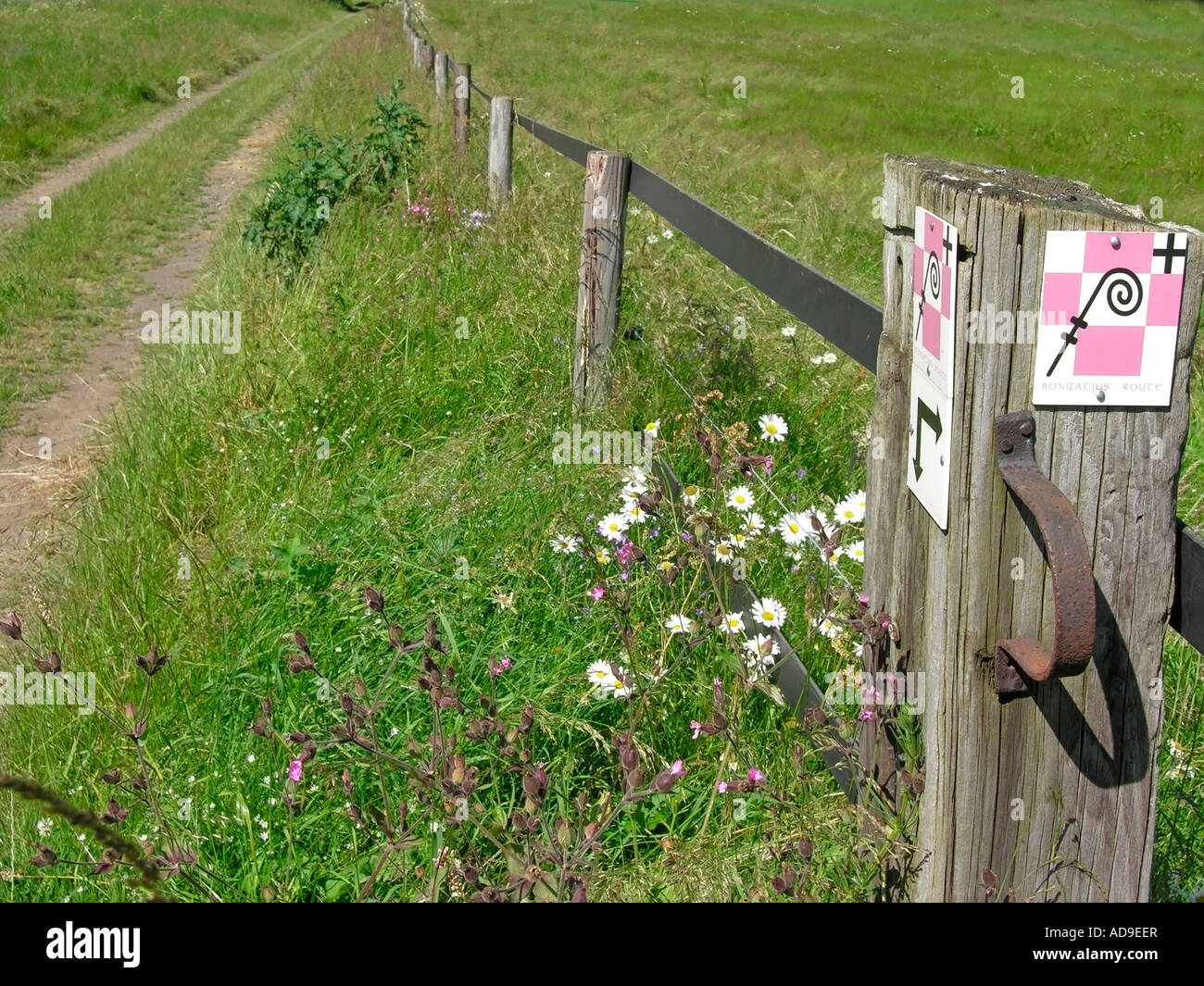 symbol for the pilgrim road Way of Saint Boniface at the wayside Stock Photo