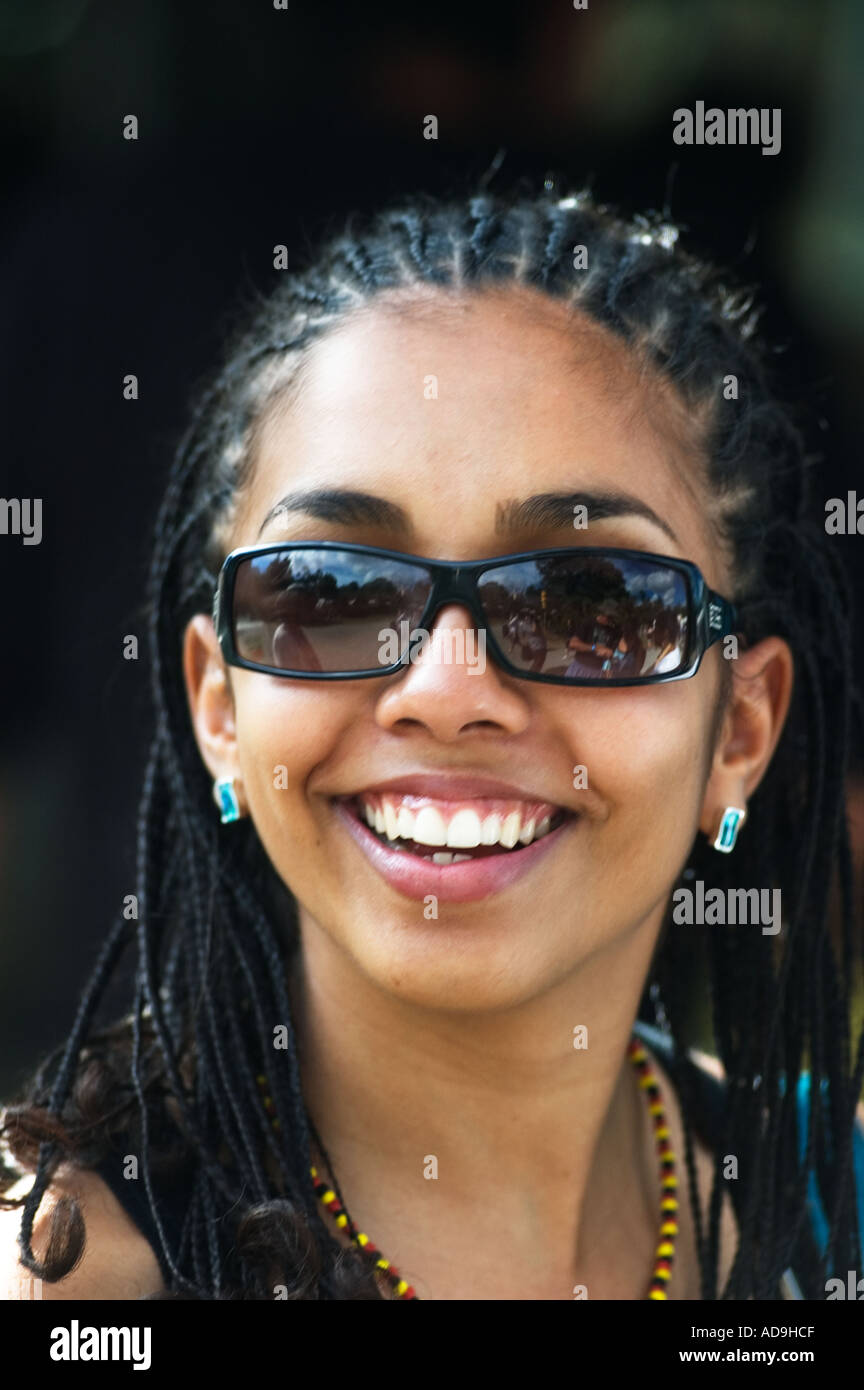 young Australian Aboriginal Islander woman at music festival sunnies ...