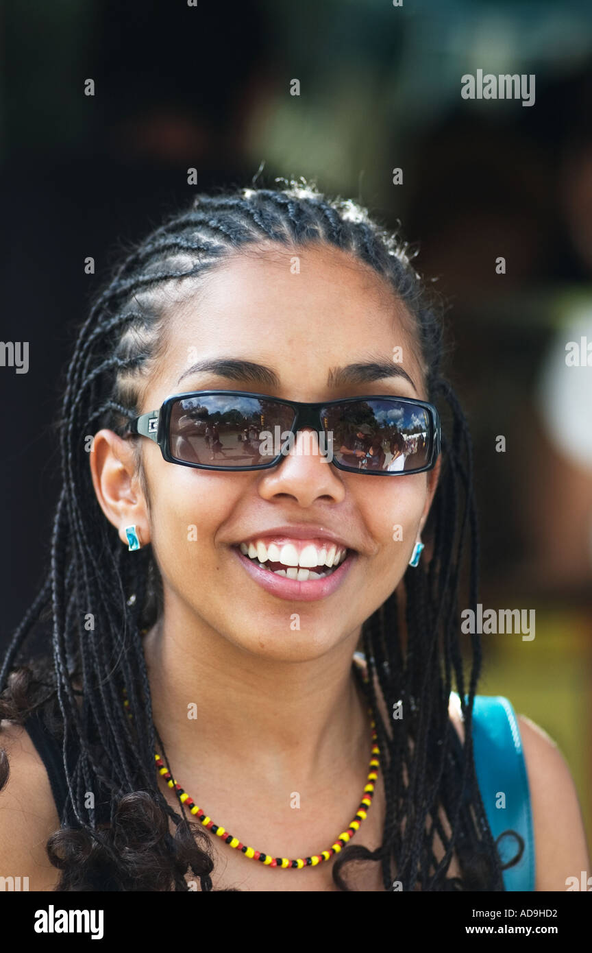 young Australian Aboriginal Islander woman at music festival sunnies ...