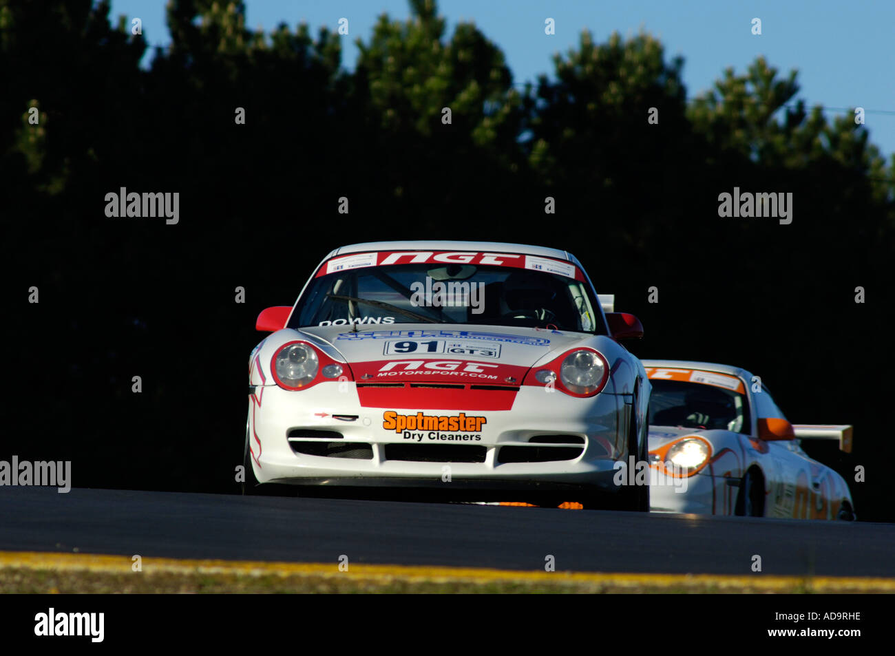 Joe Downs Porsche 911 GT3 car is followed by team mate Ramez Wahab at the GT3 in the IMSA GT Cup Challenge at Mid-Ohio 2006 Stock Photo