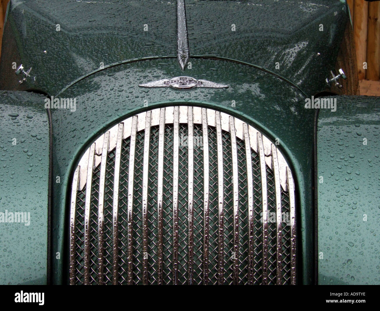 close up of front grill on Morgan Aero 8 sports car in the rain Stock Photo