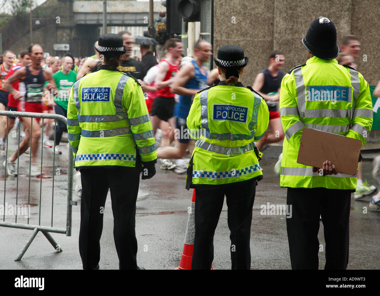 three police officers at 2006 London Marathon Stock Photo