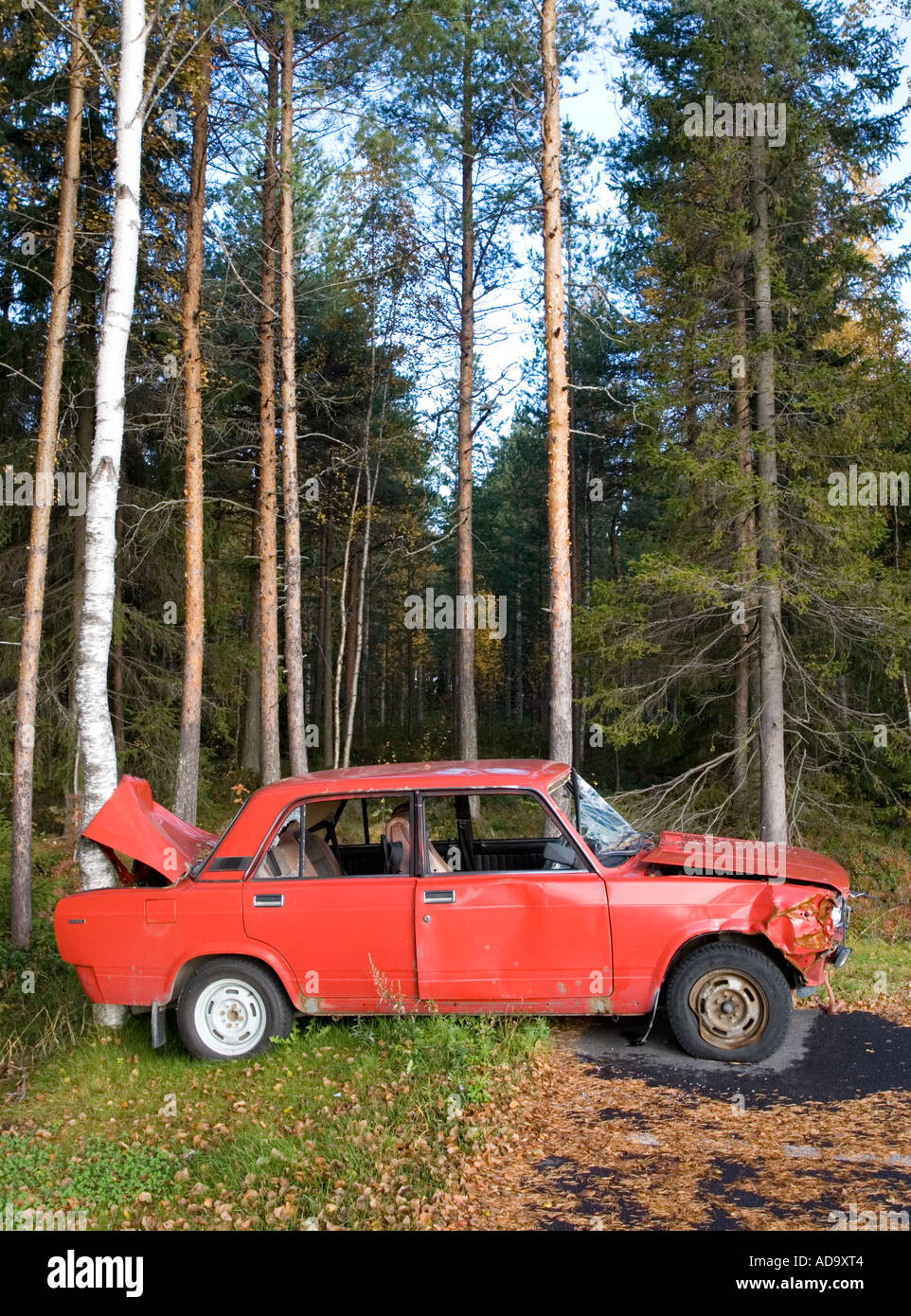 Side profile of a Lada which hit a tree , Finland Stock Photo