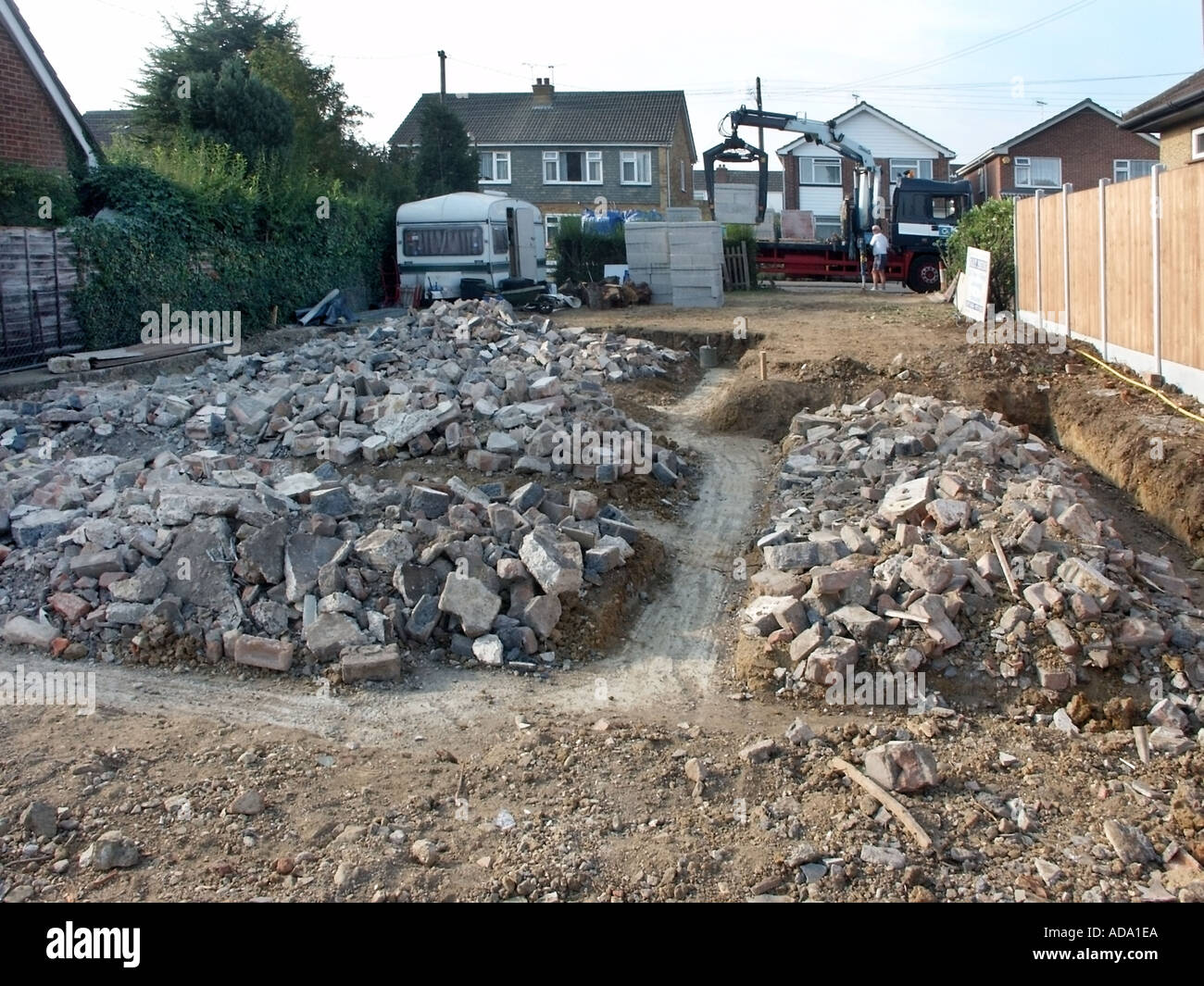 Work in progress on new detached house trench fill concrete foundations