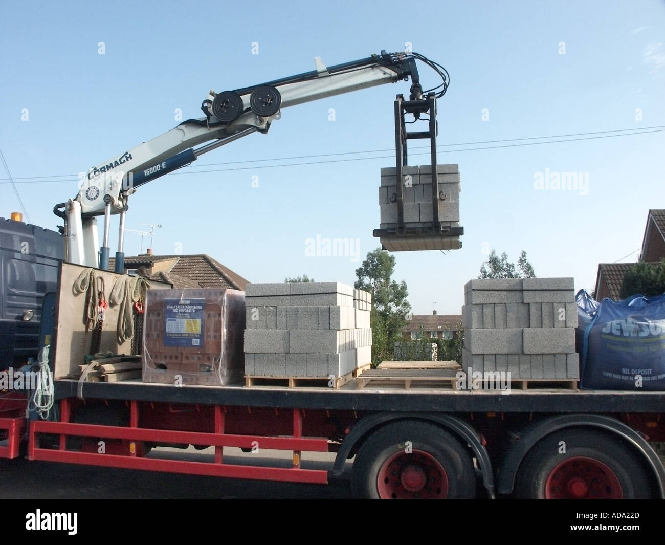 Essex mechanical unloading of lorry with load of concrete ...