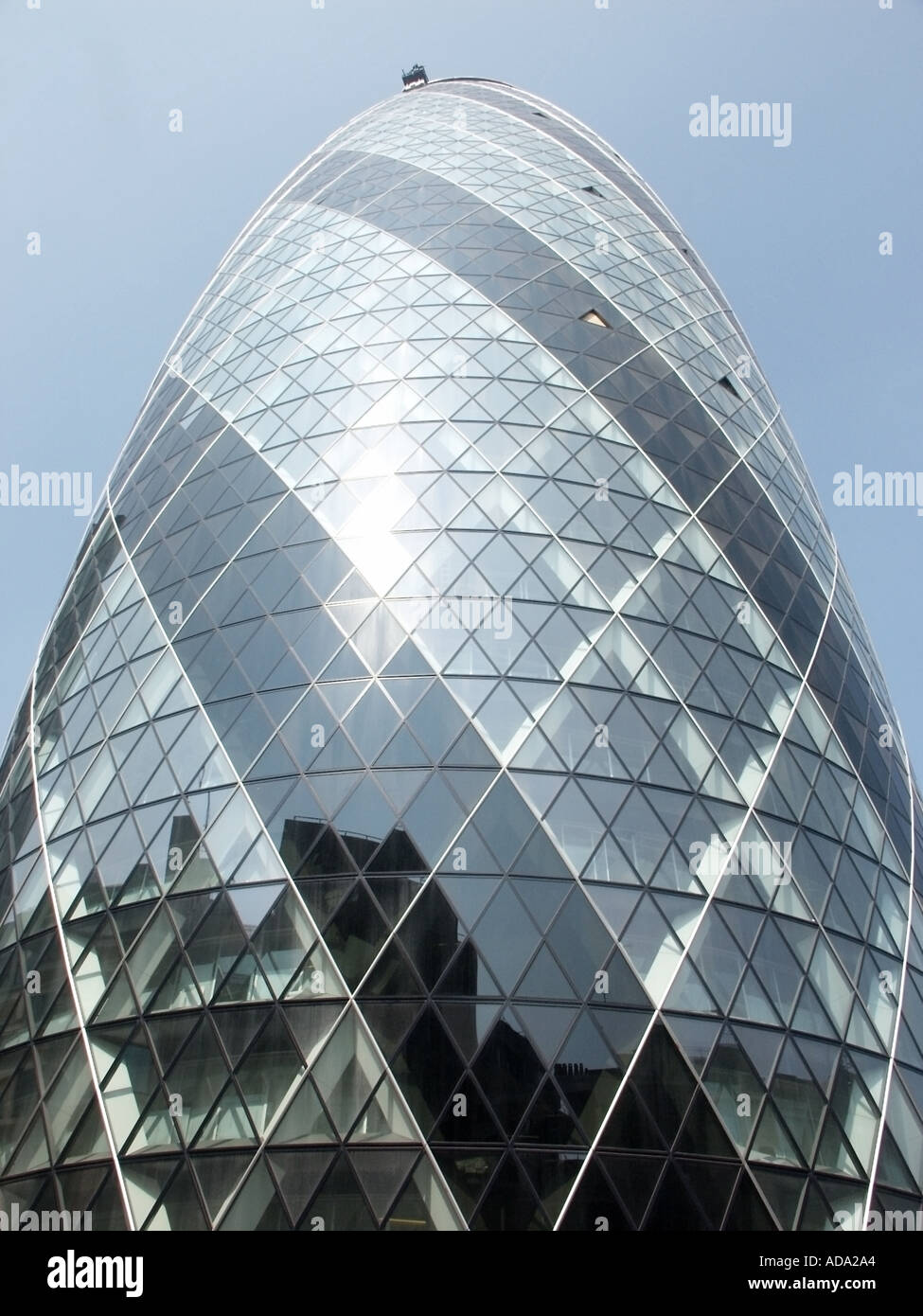 Close up of unusual shaped Gherkin modern office skyscraper landmark ...