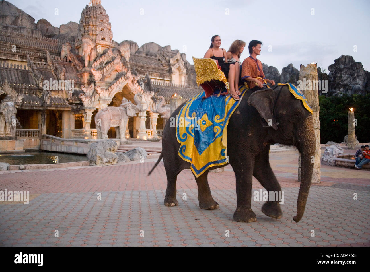 Tourists riding on a elephant Palace of the Elephants Phuket Fantasea