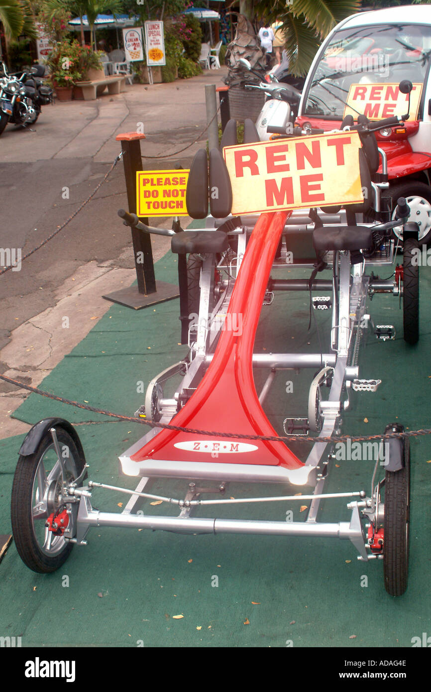 A two-seater zero emission human-powered vehicle on display and available for rent. Stock Photo