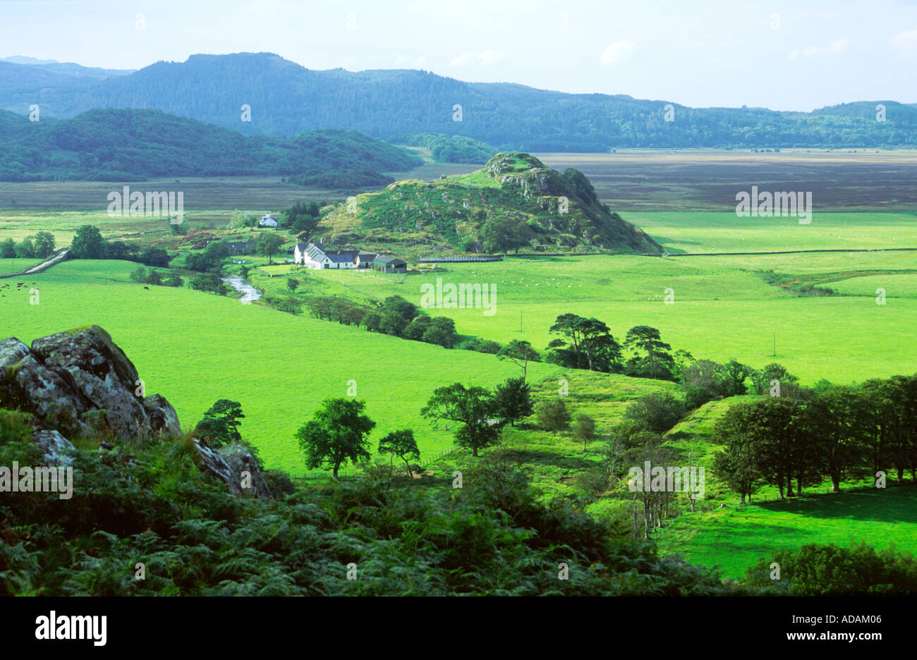 Dunadd hillfort, first power base of Dalriada Scots in Scotland, rises above the River Add at Crinan in the Kilmartin Valley Stock Photo