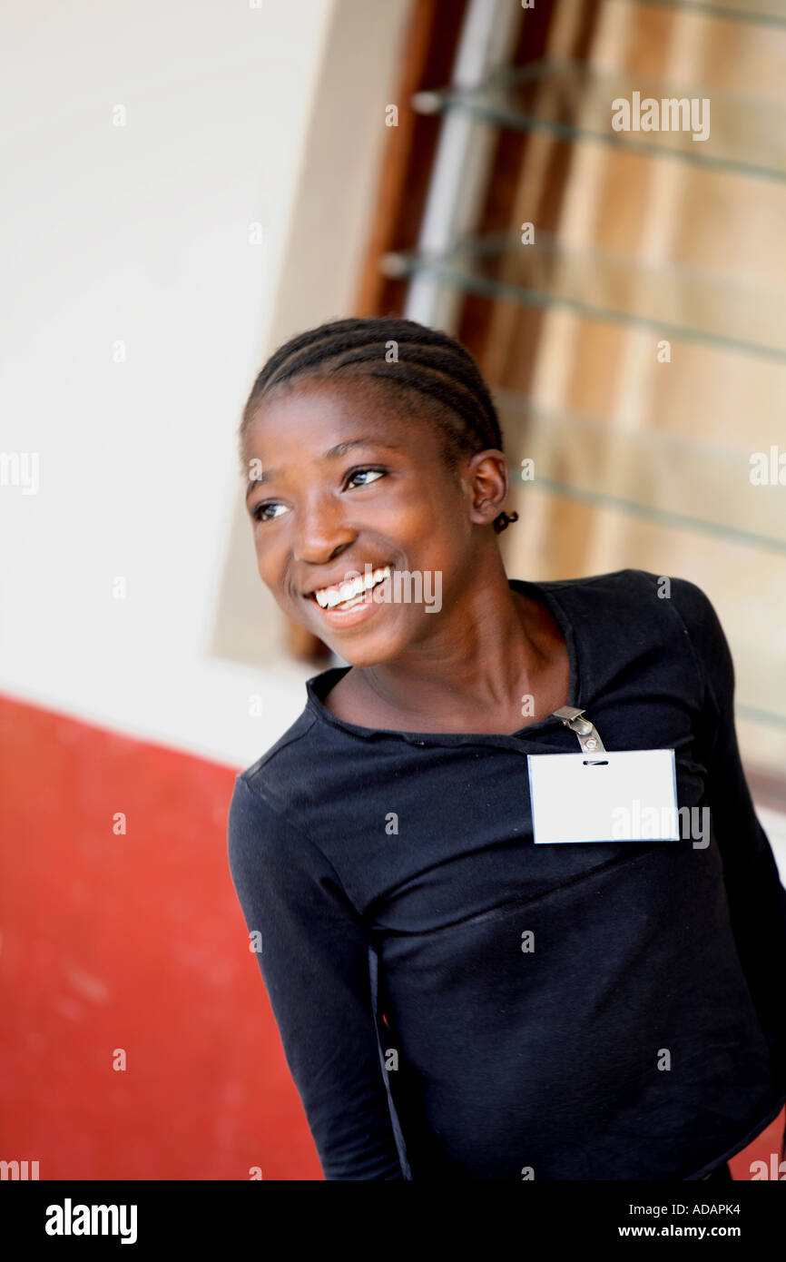 Close up portrait of smiling girl, a patient in a Sierra Leone rehabilitation hospital for polio victims and disabled children Stock Photo