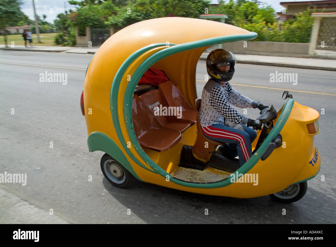 A speeding Coco motorcycle taxi in the streets of Varadero, Matanzas, Cuba. Stock Photo