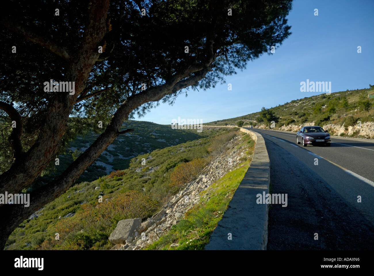 Car on a countryside road going from Marseille to Cassis France Stock Photo