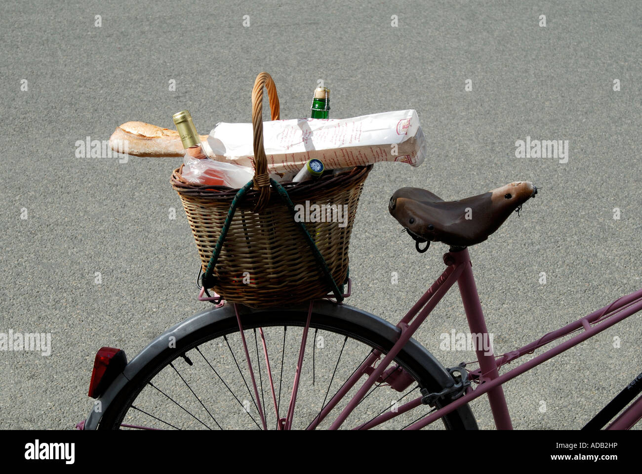 Loaded bicycle basket, France. Stock Photo