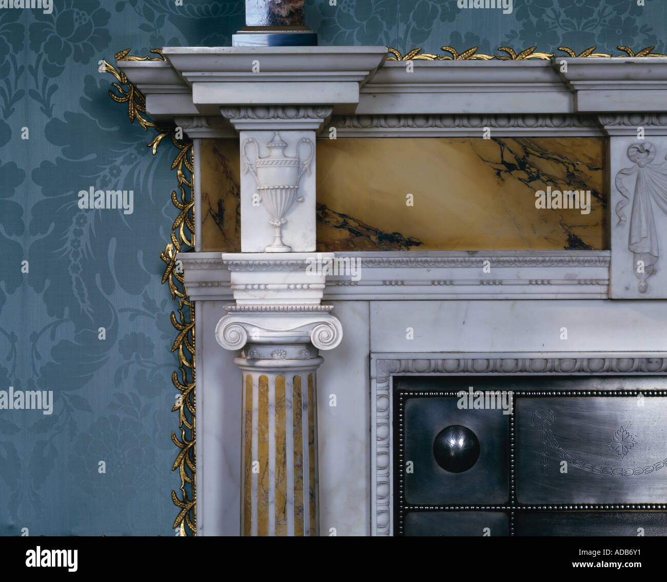 Kedleston Hall, Derbyshire, England, 1759 - 1765. The State Boudoir. Fireplace with inlaid veined marble mantlepiece. Stock Photo