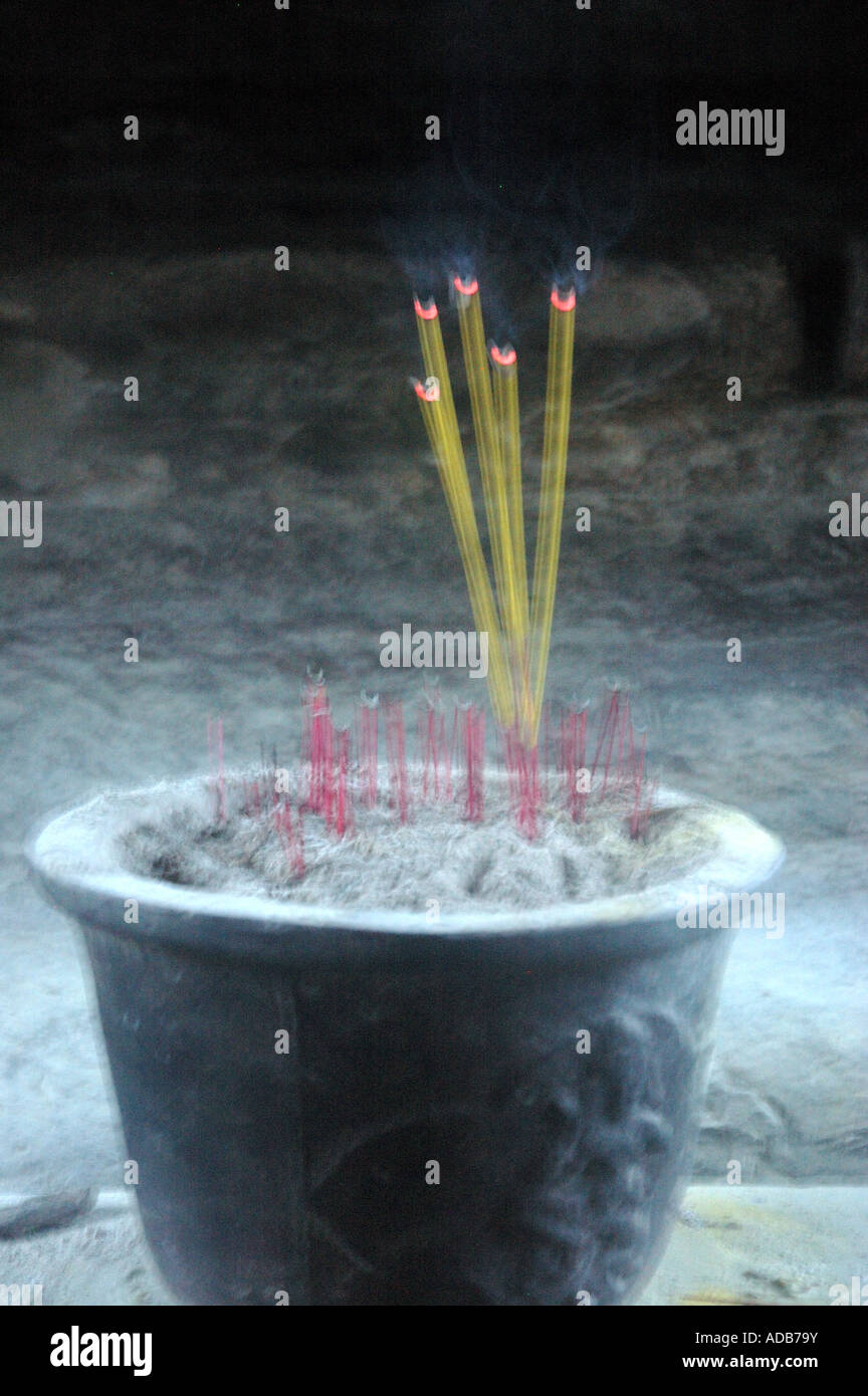 Burning Incense sticks in Angkor Wat in Cambodia Stock Photo - Alamy