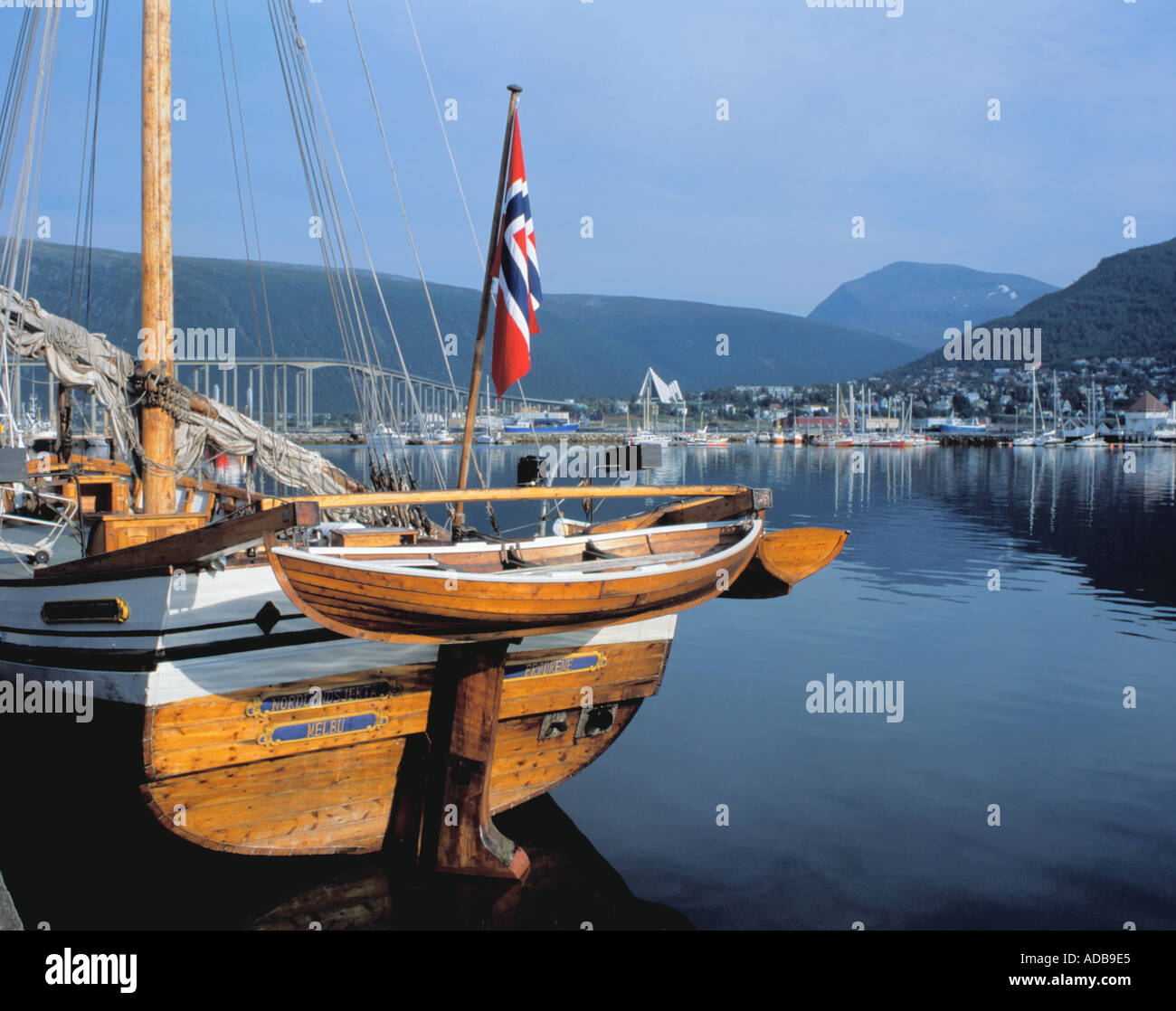 Stern of old wooden sailing ship and harbour scene, Tromsø, Troms, arctic Norway. Stock Photo