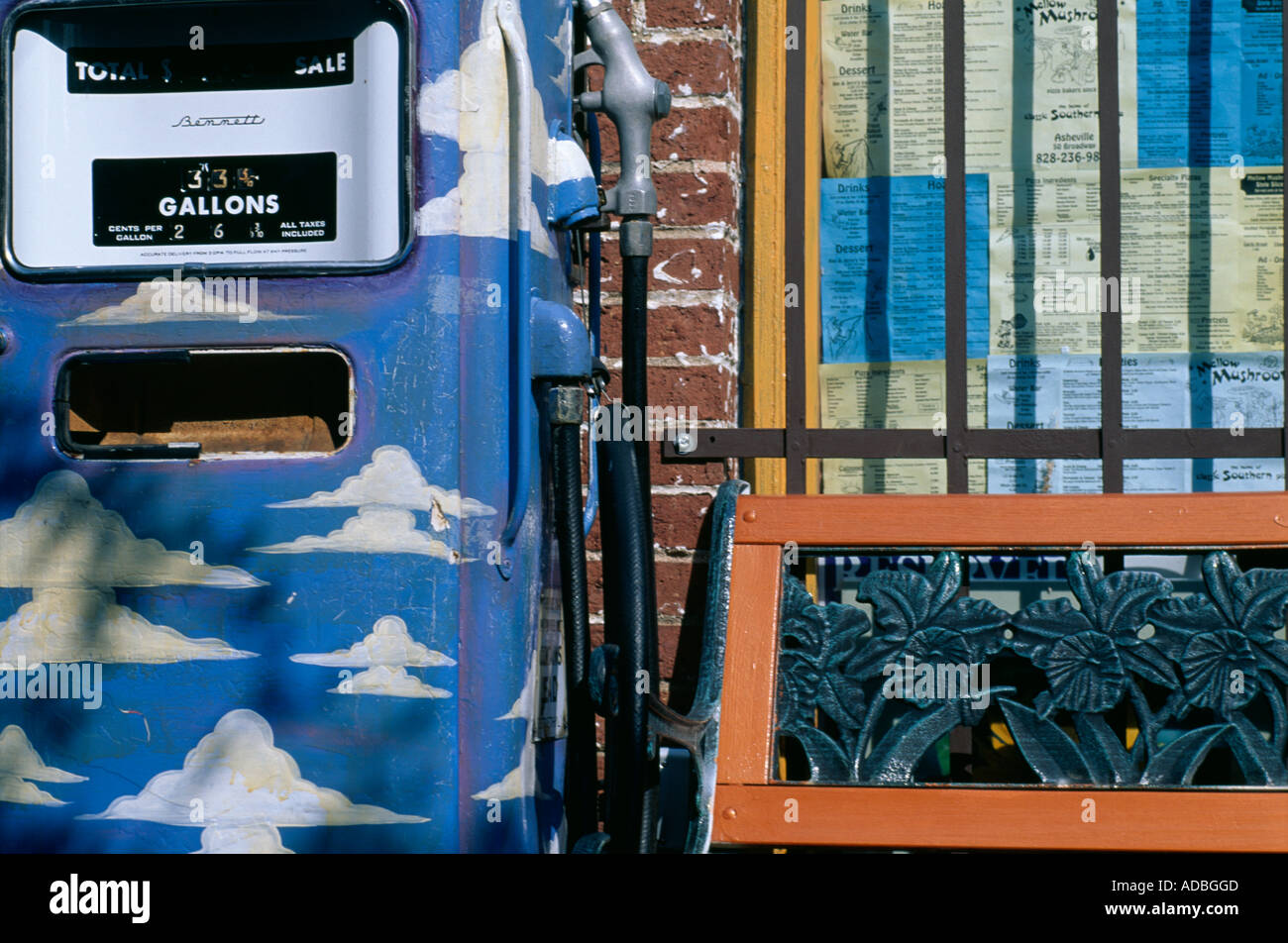 Brightly painted old fashioned gas pump Asheville North Carolina USA