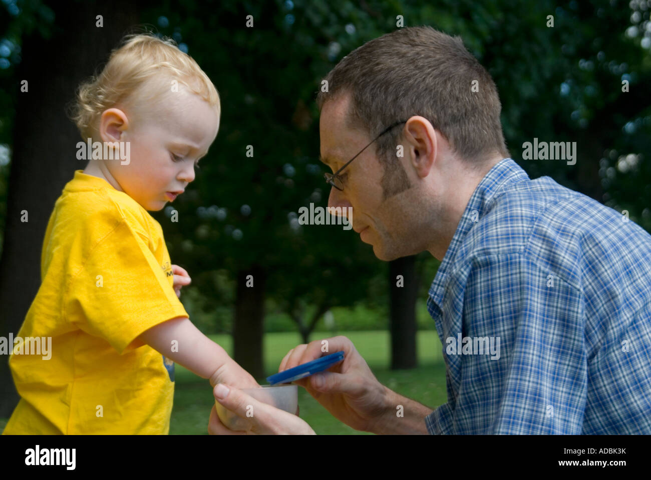 Horizontal close up portrait of a 16 month old baby boy with his dad
