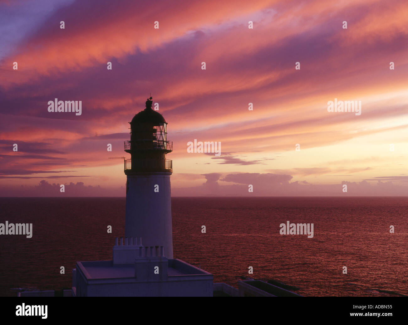 dh  RUDHA REIDH ROSS CROMARTY Lighthouse and sunset over The Minch Scotland evening red purple dusk sun set Stock Photo