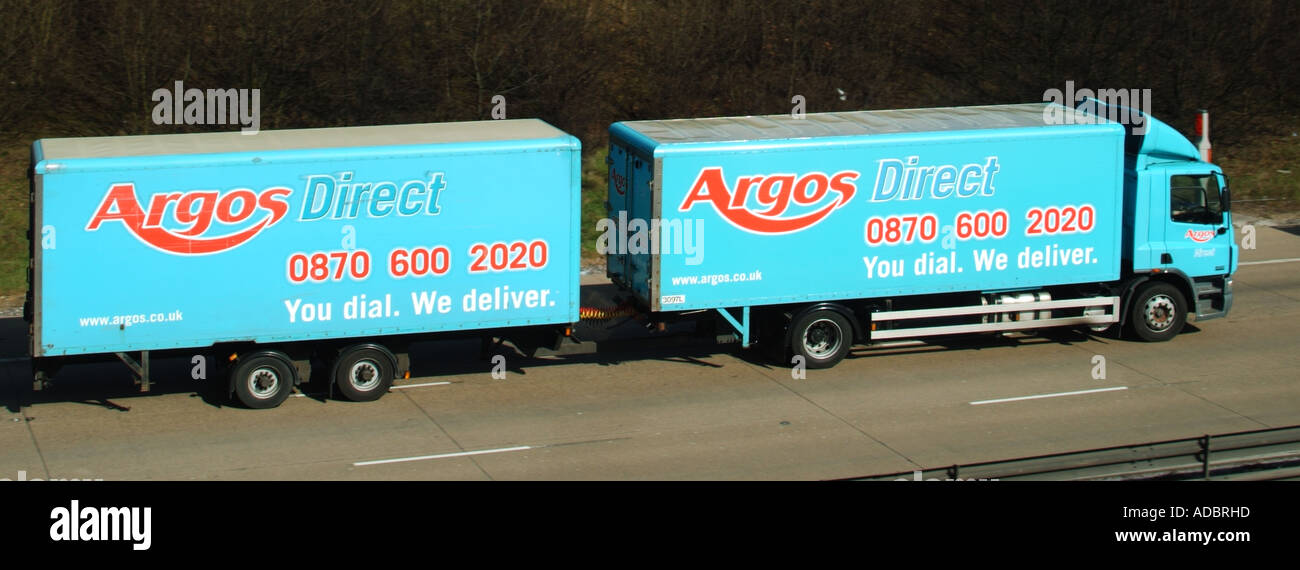 M25 motorway Argos lorry towing trailer Stock Photo Alamy