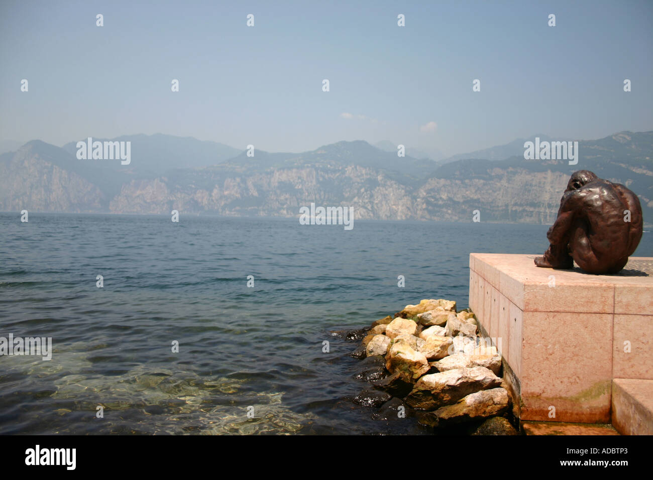 Man sitting on lake hi-res stock photography and images - Alamy