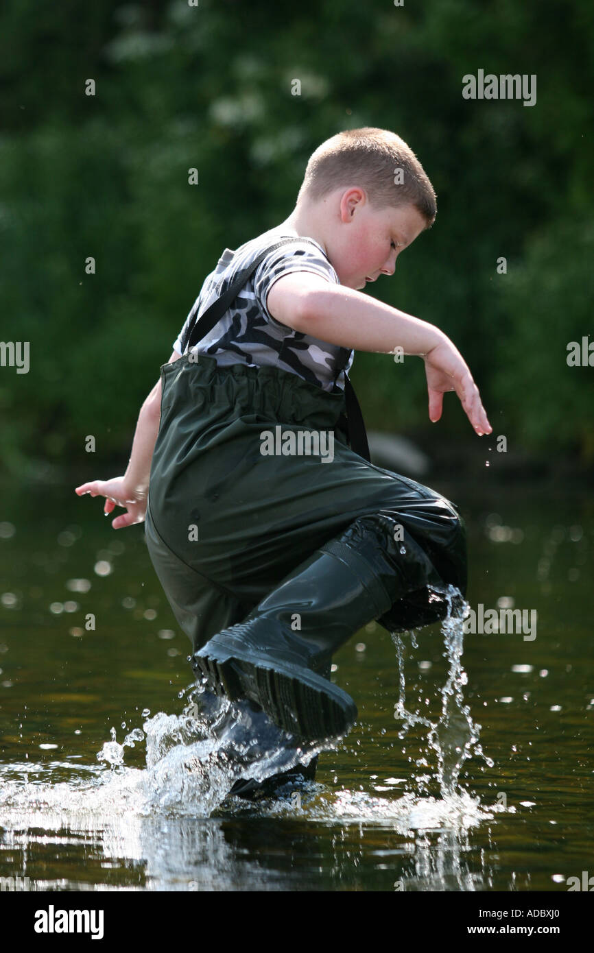 '12 year old Curtis fishing on the river Lune, Lancashire England' Stock Photo