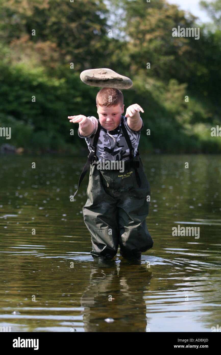 Throwing rocks hi-res stock photography and images - Alamy