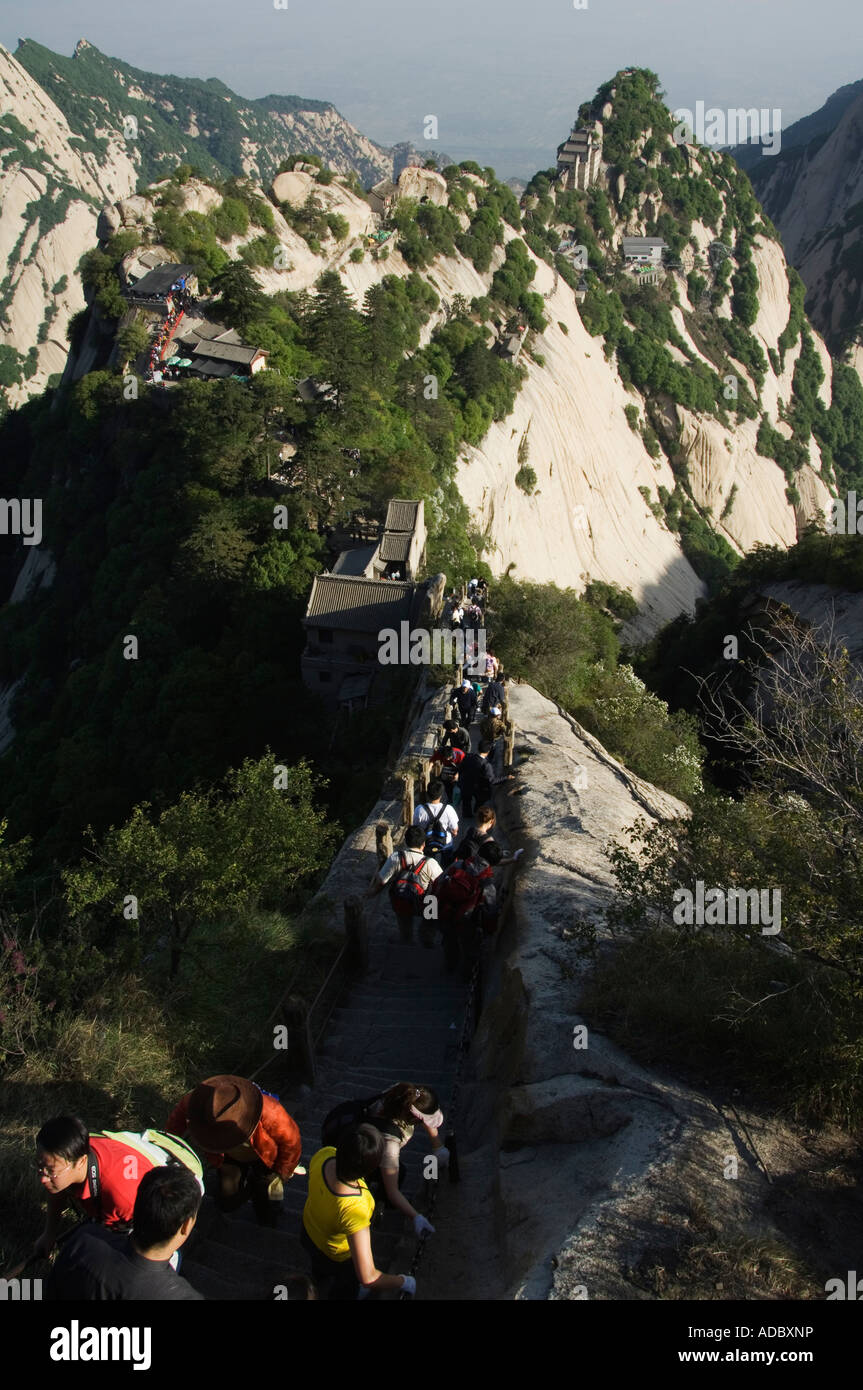 hikers on a trail at Hua shan granite peaked mountain 2160m Shaanxi Province China Stock Photo