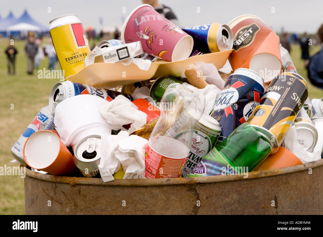 Litter rubbish in a rubbish bin waste food paper plates cups cans Stock Photo Alamy