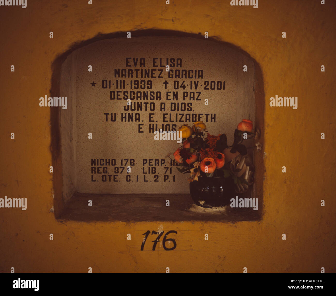 Niche with a vase of flowers in the San Miguel cemetery in Oaxaca