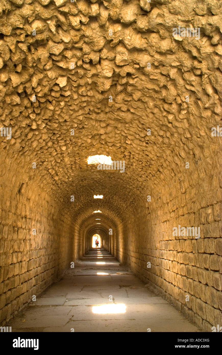 Arched tunnel in ruins of Roman healing center of Asclepion, at ancient